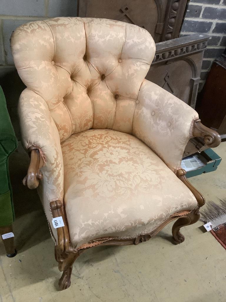 A Victorian walnut button back armchair, width 77cm